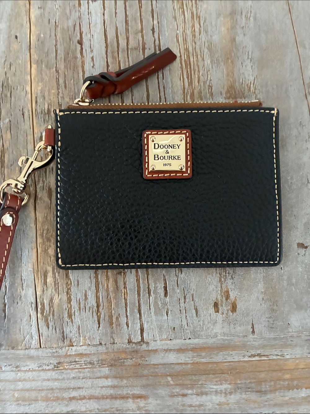 Dooney & Bourke Black Leather Zip Card Holder with Brown Trim and Wrist Strap